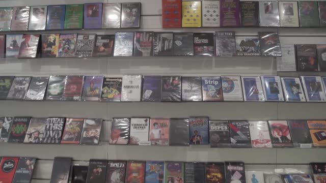 CD and DVD disks on the shelf