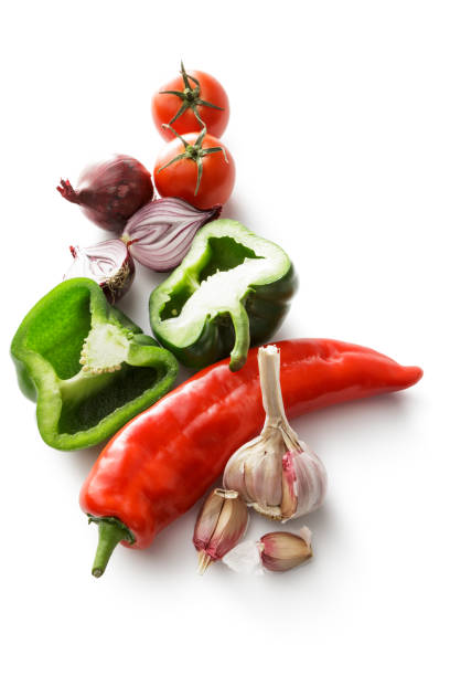 Vegetables: Peppers, Garlic, Onion and Tomatoes Isolated on White Background