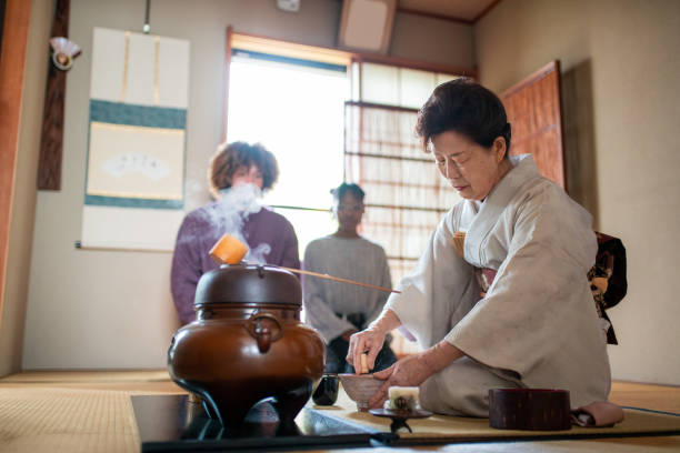 istock Japanese tea master whisking matcha tea 1153243609