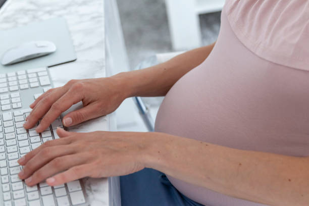 istock Close Up Of WomanTyping On Computer Keyboard 1153244680