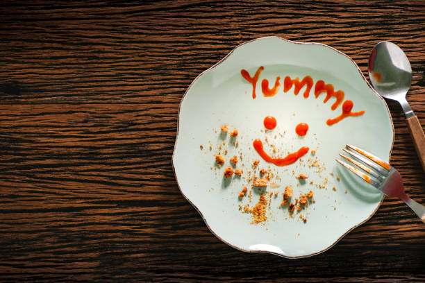 istock Food Review and Client Experiences Concept. Happy Customer using a catchup Sauce Giving a Positive Review after finish Meal in Cafe or Restaurant. Feedback and Satisfaction Survey 1153247647