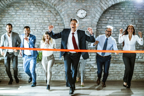 istock Sports race in a board room! 1153250154