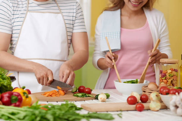 istock Couple cooking together 1153250792