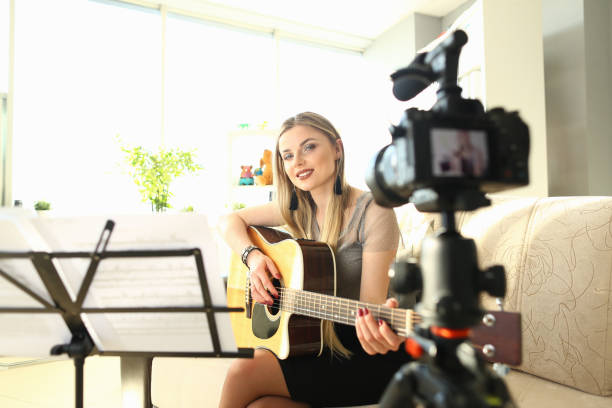 istock Female Blogger Creating Art Musical Vlog Content 1153250956