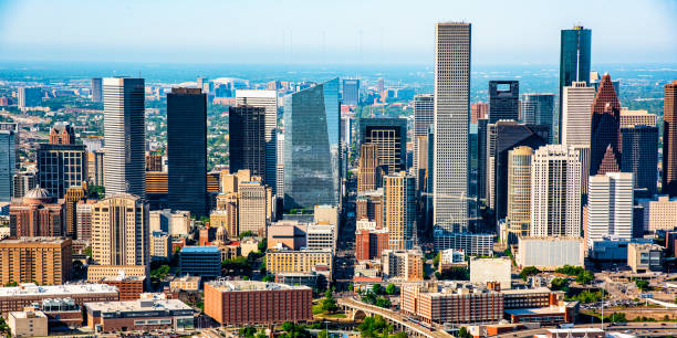 Skyscrapers of Downtown Houston Aerial view of the beautiful downtown district of Houston, Texas, USA. houston skyline stock pictures, royalty-free photos & images