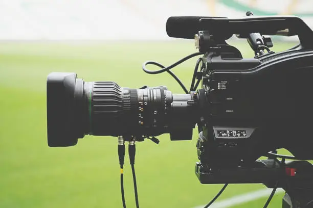 Photo of Close-up picture of a professional tv camera before broadcasting.