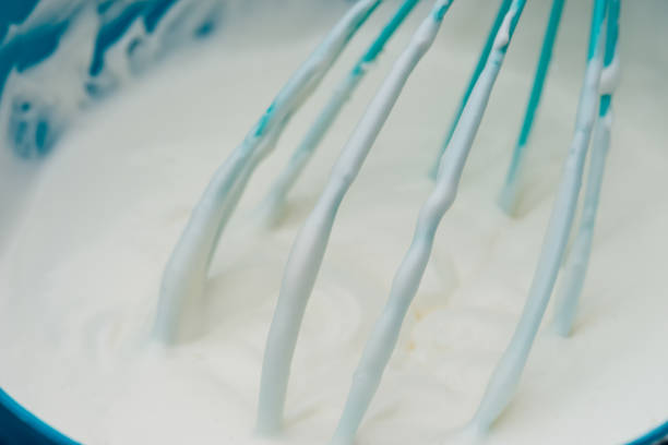 istock The white cream in the blue plastic bowl 1153256426