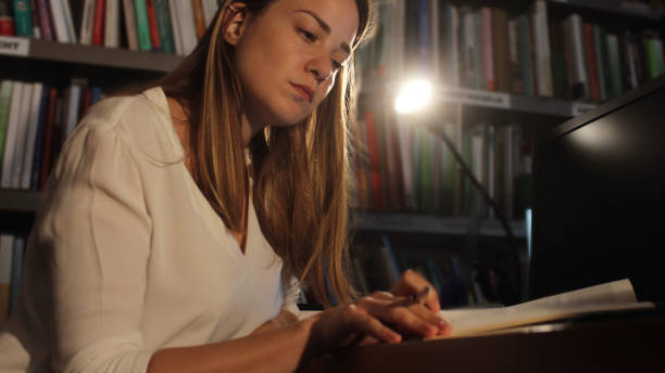 istock Young woman modern Librarian 1153258842