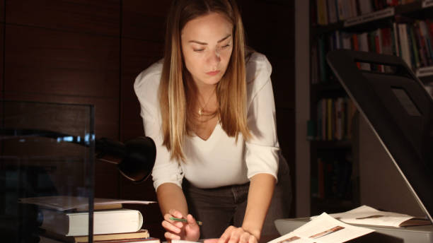 istock Young woman modern Librarian 1153258905