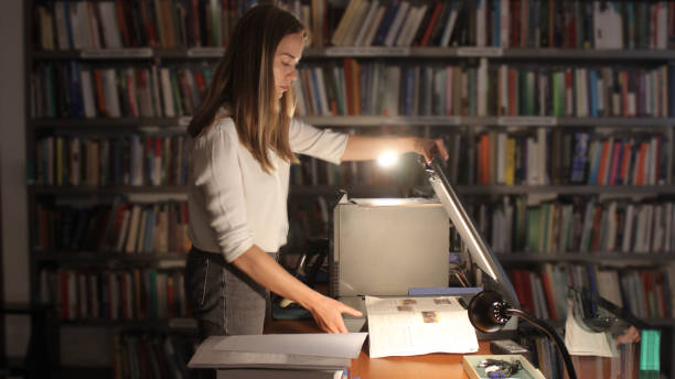 istock Young woman modern Librarian 1153259051