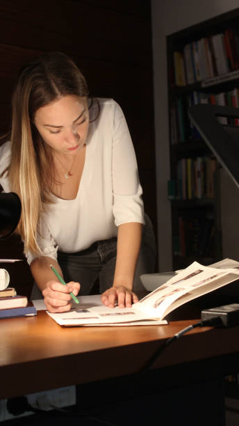 istock Young woman modern Librarian 1153259093