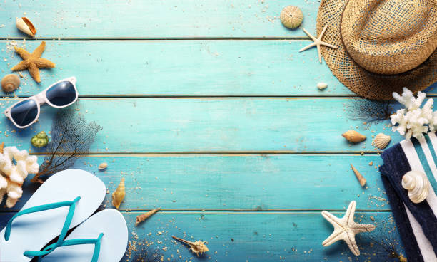 istock Beach Background - Summer Accessories On Blue Plank 1153259178