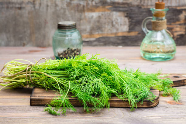 istock A bunch of fresh dill on a cutting board on a wooden table 1153260690