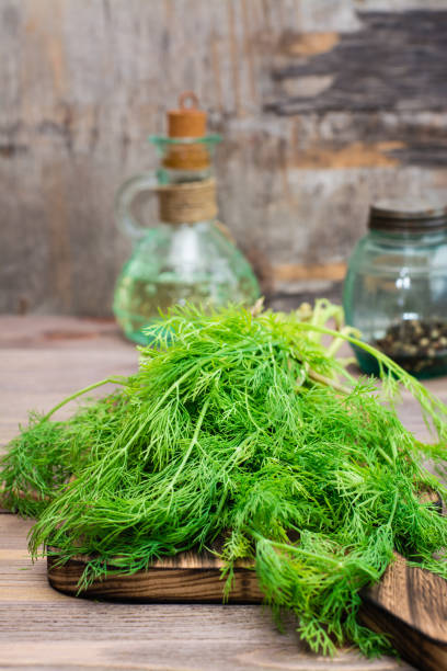 istock A bunch of fresh dill on a cutting board on a wooden table 1153260692