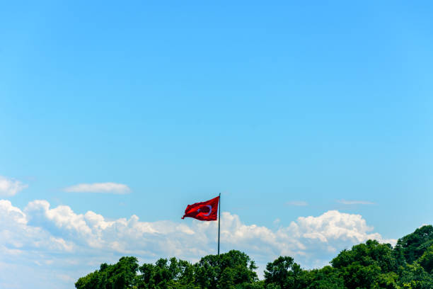 istock The turkish flag flagging above the trees 1153261597
