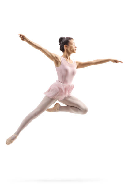 istock Female ballerina performing a jump 1153261978