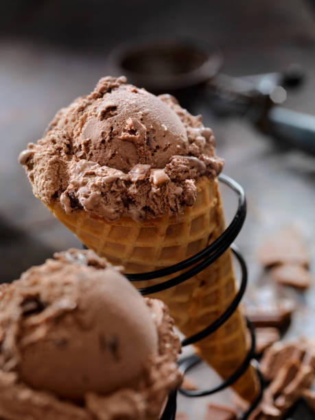 istock Double Chocolate Chunk Ice Cream in a Waffle Cone 1153264577