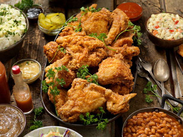 Fried Chicken Feast Fried Chicken Feast fried chicken stock pictures, royalty-free photos & images