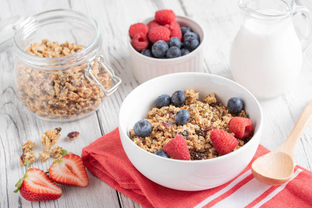 istock fruit and seed granola with milk and berries 1153266522