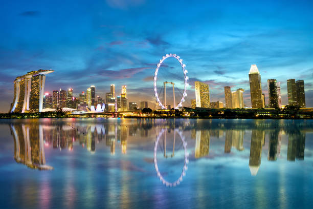istock Singapore skyline at dusk 1153268123