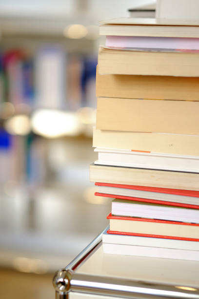 istock Stack of books on a shelf in a library 1153270650