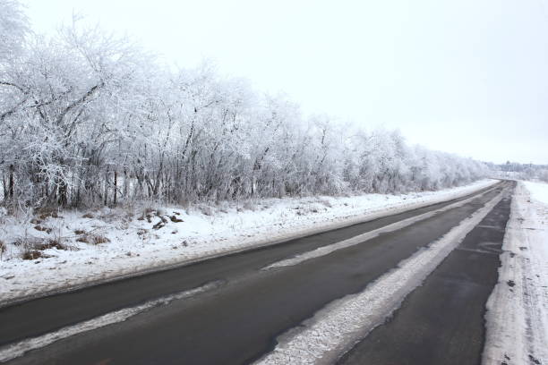 istock A snowy road during the winter season. 1153272124
