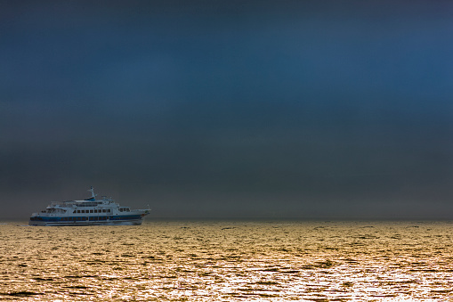 Ferry in the San Francisco Bay area of California in late afternoon fog