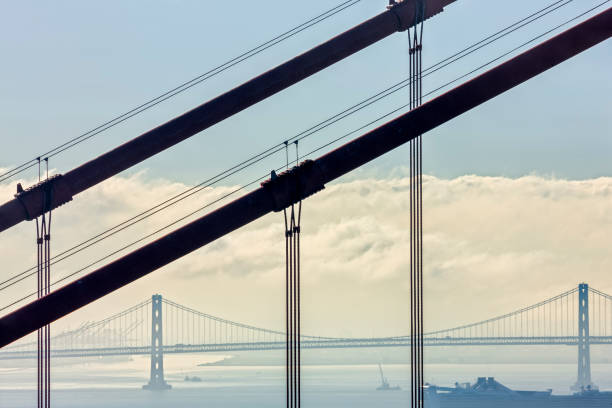The Golden Gate Bridge in San Francisco California  with view of the Oakland Bay Bridge