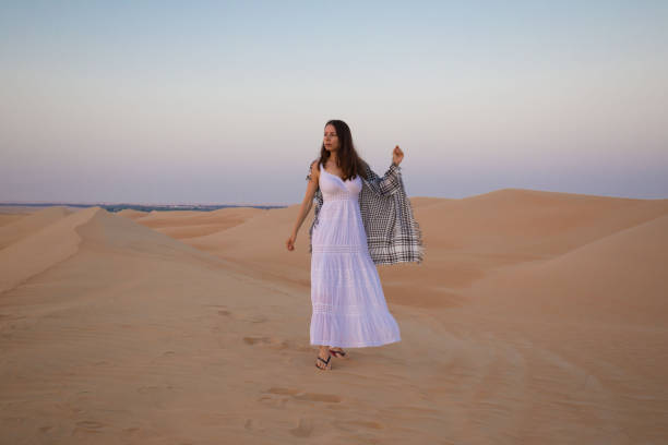 istock UAE. Woman in desert 1153274456