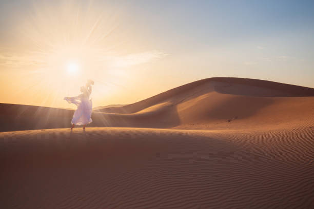 istock UAE. Woman in desert 1153274657