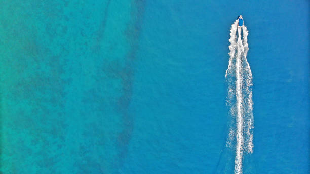 istock Aerial. Speedy boat sailing by sea. Top view, copy space. 1153274662