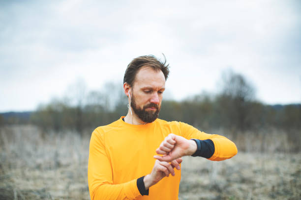 istock Young man running on the field 1153276078