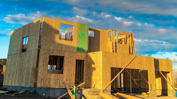 istock Panorama Framework of a house under construction viewed on a bright sunny day 1153277228