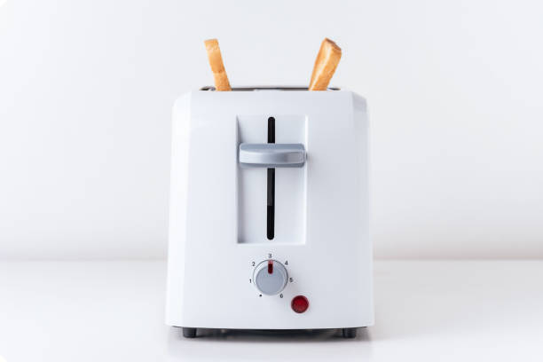 istock Toaster with  roasted toast bread on white background, close up 1153277385
