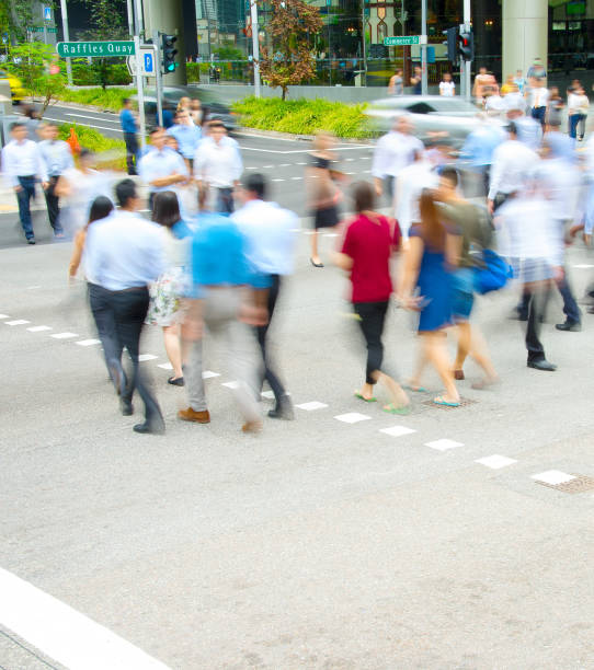 istock Rush hour, people at crosswalk 1153278267