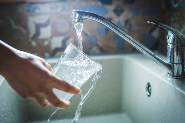 istock consumption of drinking water 1153278407