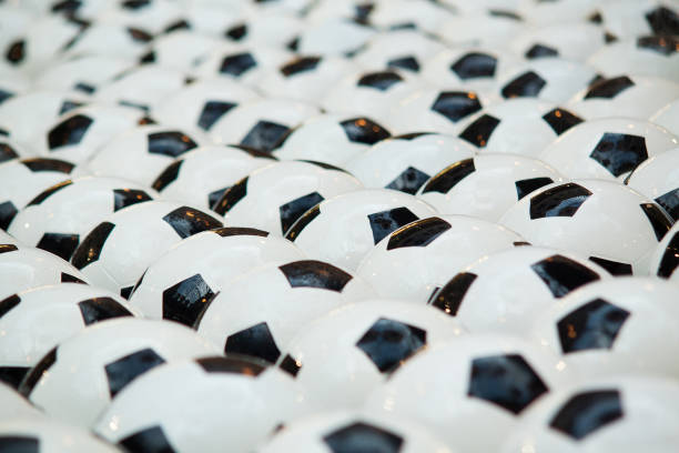 istock wet soccer balls, prepared for playing or training 1153278917