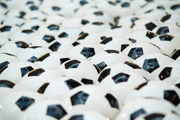 istock wet soccer balls, prepared for playing or training 1153278924