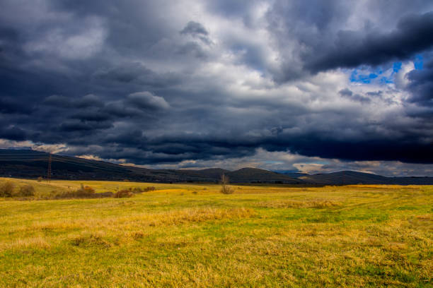 istock The beautiful landscape with the fields and mountains 1153281580