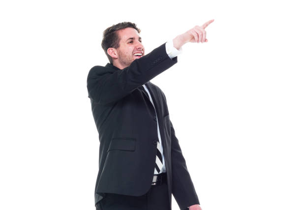 istock Young handsome businessman wearing a suit and tie - pointing up 1153283742