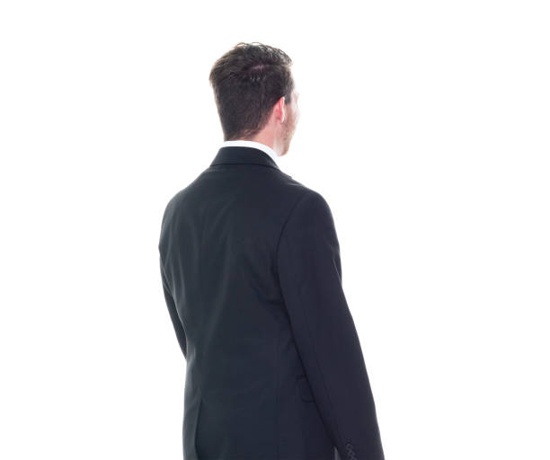 istock Young handsome businessman wearing a suit and tie - hands by side 1153283823