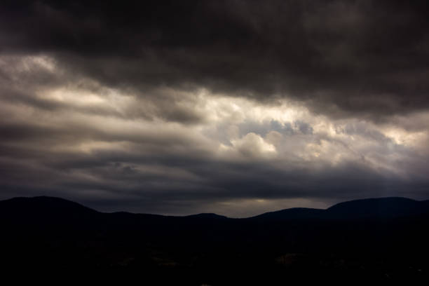 istock The scenic view to the mountains while the clouds are above it 1153284075