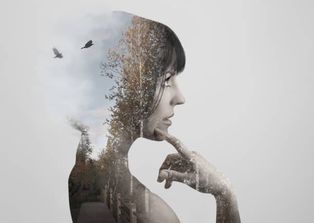 istock Multiple Exposure of young woman and nature 1153285273