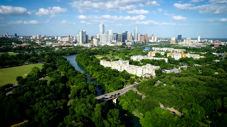 Barton Creek Bridge and green Landscape of Austin Texas 2019 Cityscape Skyline in the background