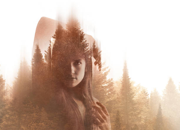 istock Multiple Exposure of woman morphing into nature 1153289660