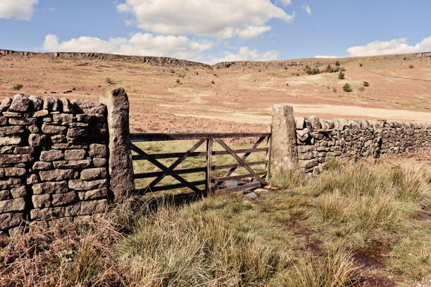 Wooden gate on a hiking path in the Yorkshire Dales, England, UK.