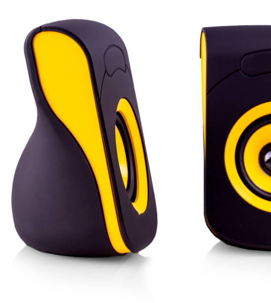 istock The computer speakers with yellow and black design on isolate white background 1153301770