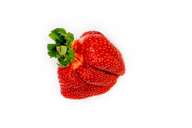 istock Fresh Organic Strawberry. Imperfect Isolated Fruit 1153302974