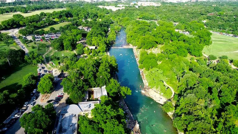 Huge Crowds Swimming at Barton Springs Pool in Austin , Texas