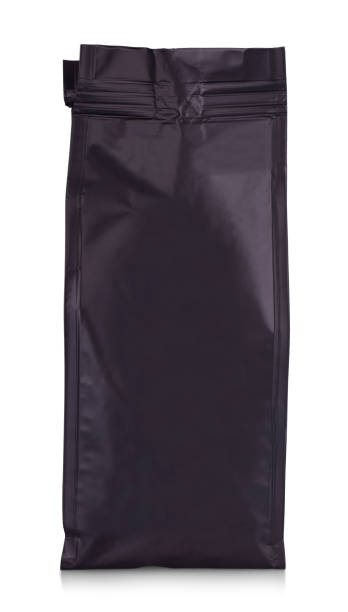 istock Black blank matte plastic paper bag front view isolated on white background. 1153304147